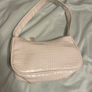 White faux leather baguette hand bag